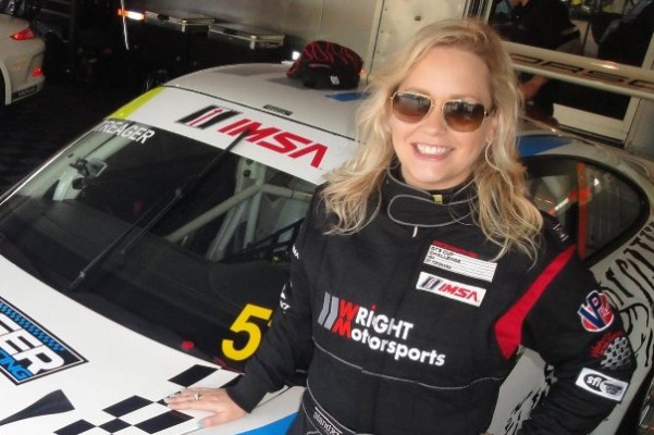 Car Guy Show Host Kristin Treager in a Cup Car